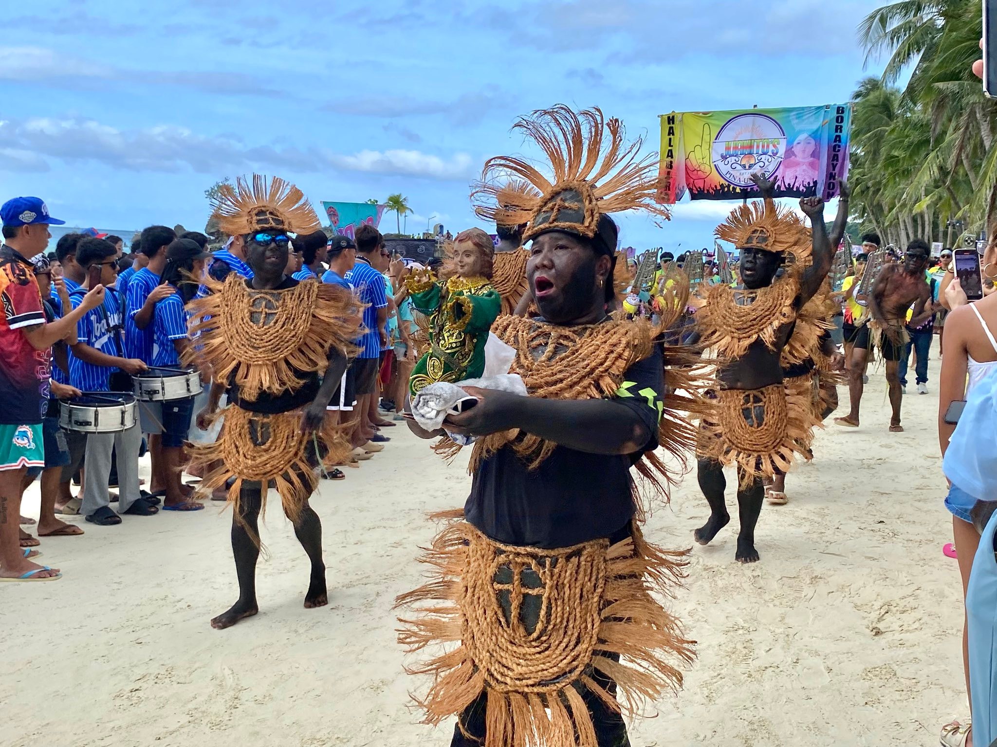 Ati-Atihan Festival performers on Boracay beach